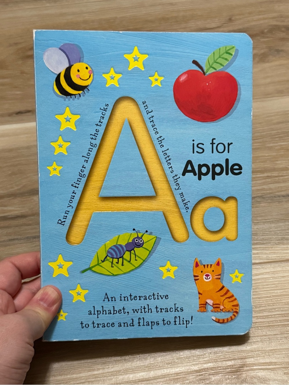 A is for Apple alphabet lift the flaps board book